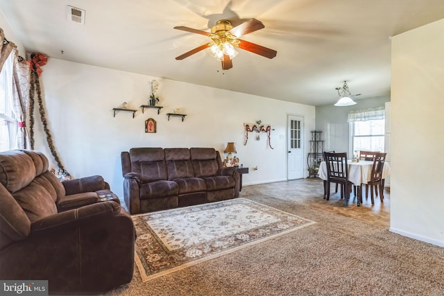 living room with ceiling fan