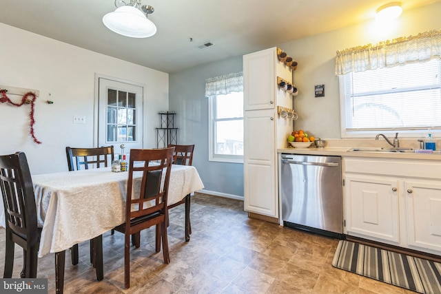 dining area featuring sink