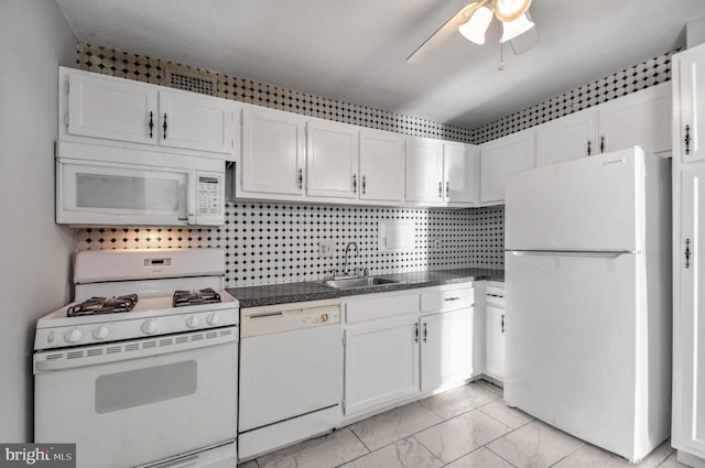 kitchen featuring white cabinetry, sink, ceiling fan, and white appliances