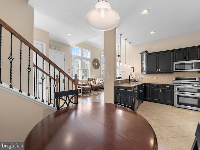 tiled dining room with sink