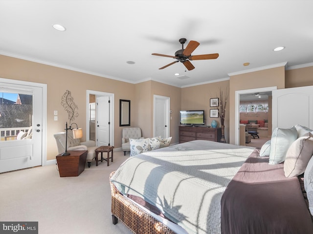 carpeted bedroom featuring ceiling fan and ornamental molding