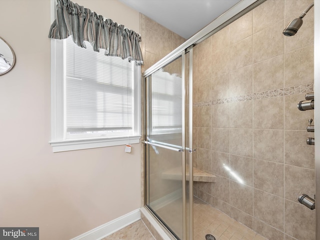 bathroom featuring an enclosed shower