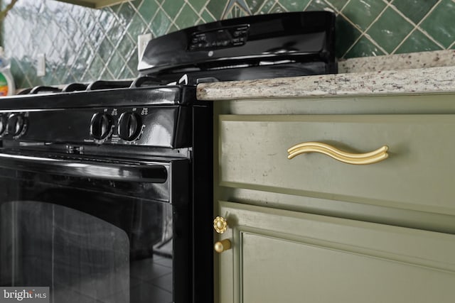 room details featuring black range with gas stovetop