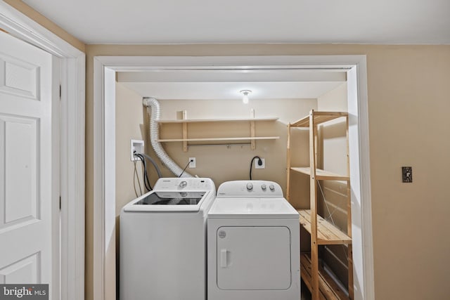 washroom featuring separate washer and dryer