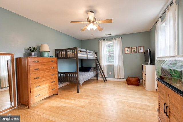 bedroom featuring ceiling fan and light wood-type flooring