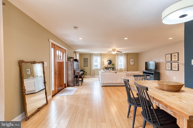 dining room featuring ceiling fan and light hardwood / wood-style flooring