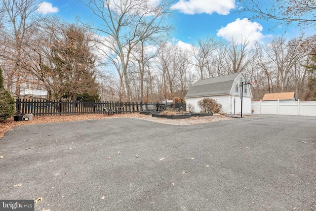 view of home's exterior featuring an outbuilding