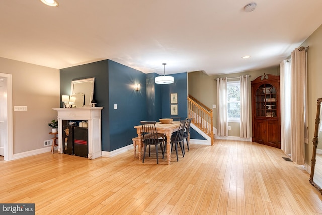 dining room featuring light hardwood / wood-style flooring