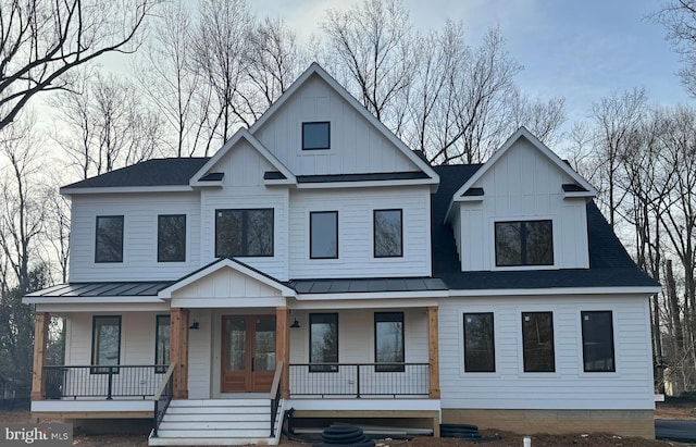 modern farmhouse style home with a porch