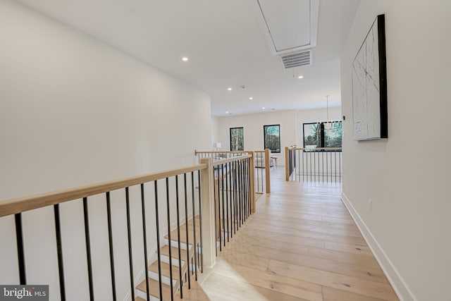 hall with light wood-type flooring