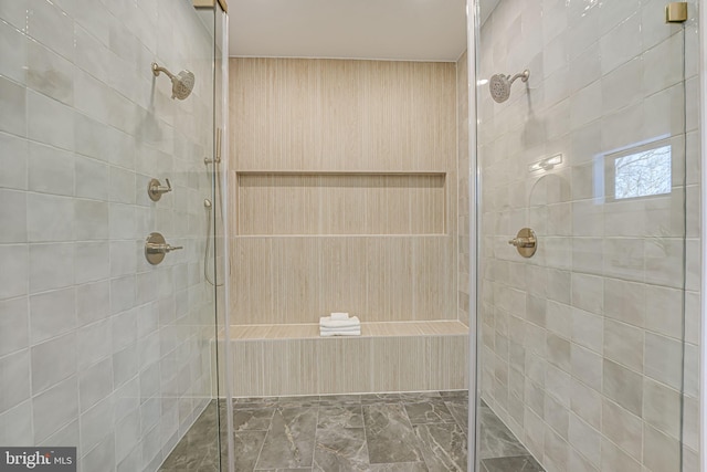 bathroom featuring a tile shower