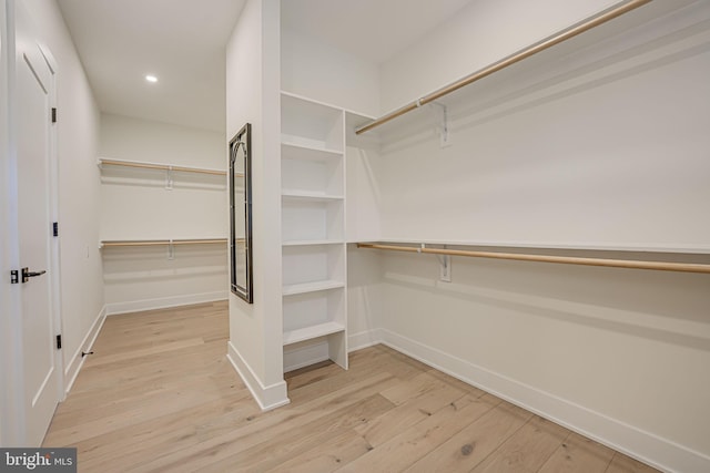 walk in closet featuring light wood-type flooring