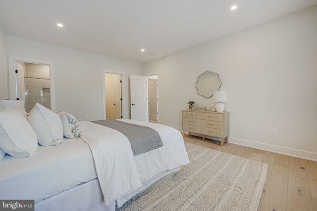 bedroom with light wood-type flooring