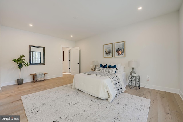 bedroom with light wood-type flooring