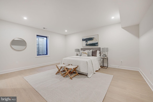 bedroom with light wood-type flooring