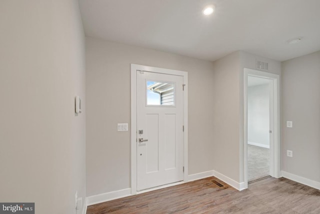 entrance foyer with hardwood / wood-style flooring