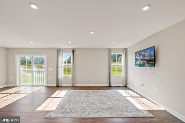 unfurnished room with light wood-type flooring