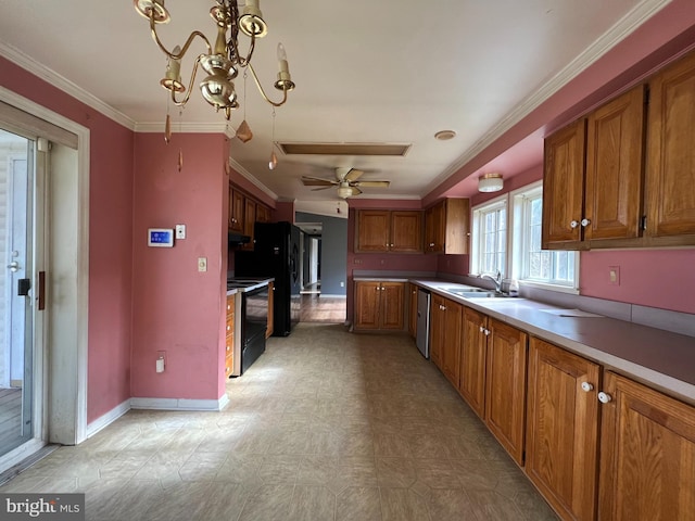 kitchen featuring pendant lighting, black appliances, ceiling fan with notable chandelier, sink, and ornamental molding