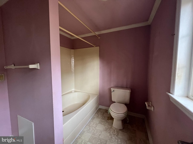 bathroom with toilet, ornamental molding, and shower / washtub combination