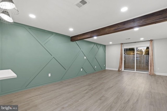 basement featuring light wood-type flooring