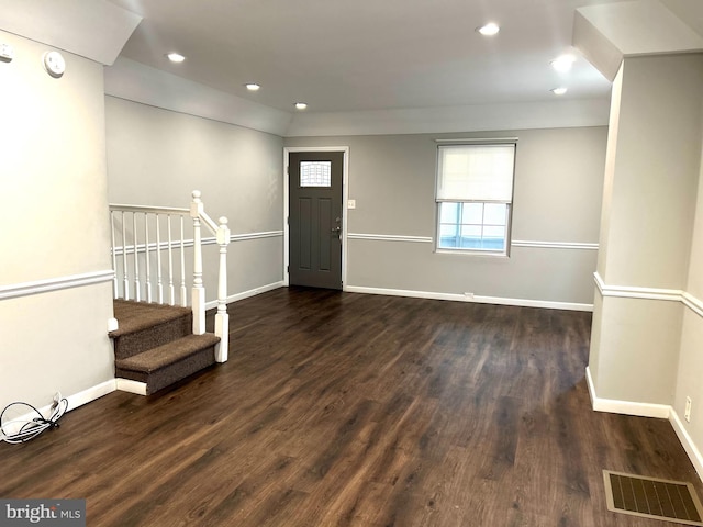 foyer with dark wood-type flooring