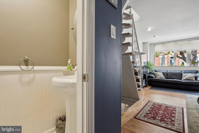 bathroom with wood-type flooring