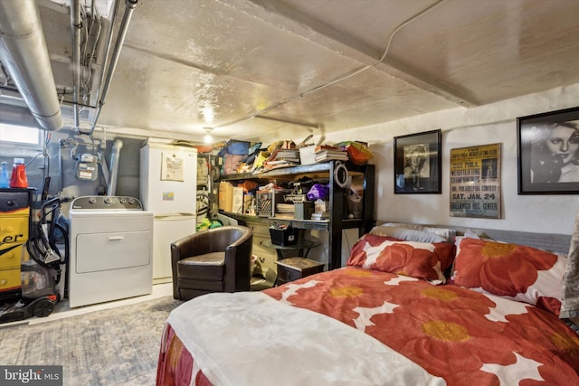 bedroom featuring washer / clothes dryer and white fridge