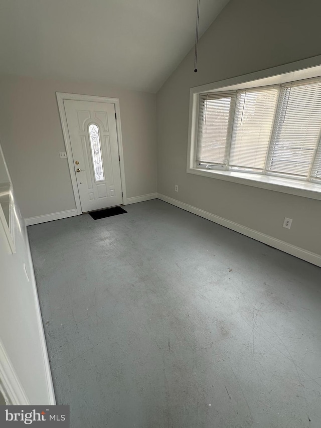 foyer with vaulted ceiling