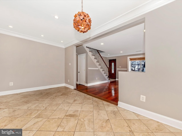 unfurnished room with ornamental molding