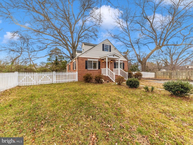 view of front of home with a front yard