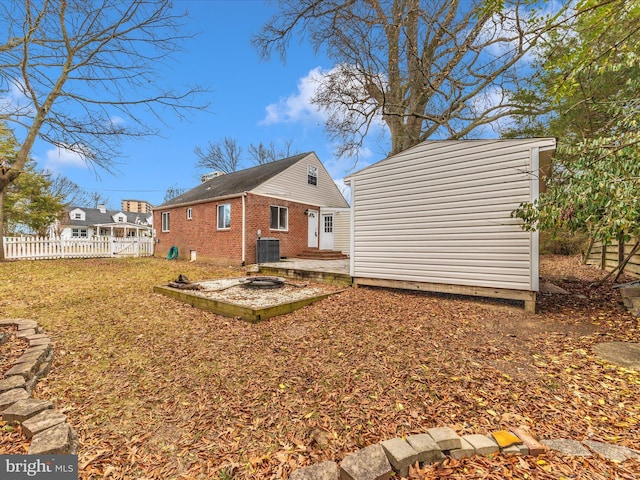 back of property with cooling unit