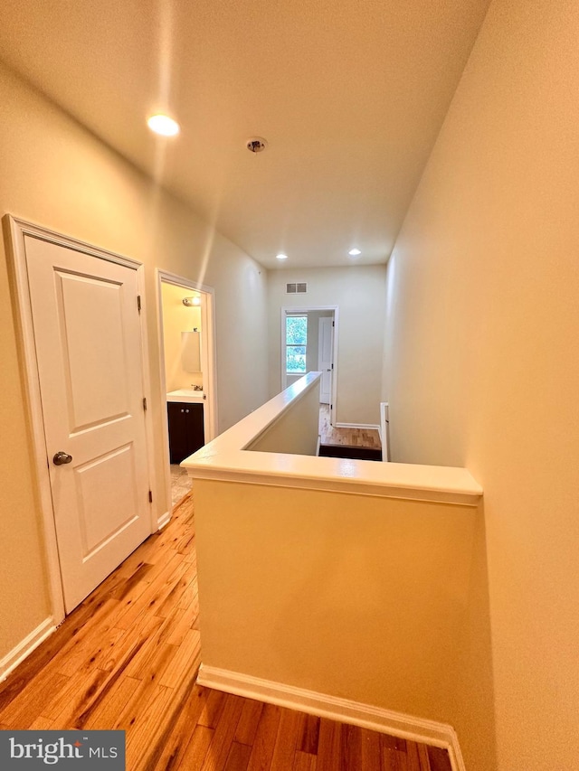 hall featuring hardwood / wood-style flooring