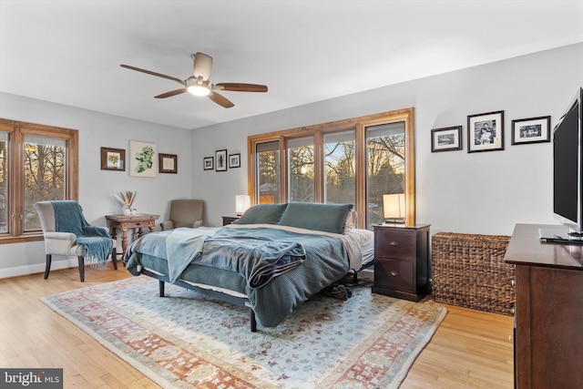 bedroom featuring ceiling fan and light wood-type flooring