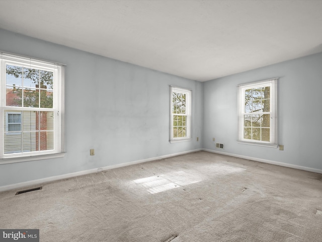 view of carpeted spare room