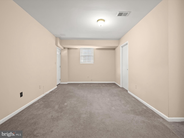 spare room with carpet floors