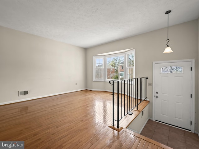 entrance foyer with hardwood / wood-style flooring