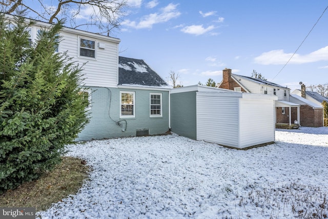 view of snow covered property