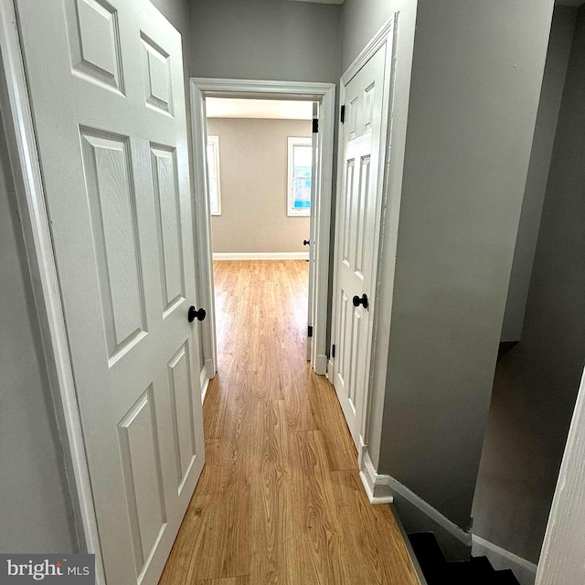 hallway featuring light hardwood / wood-style flooring