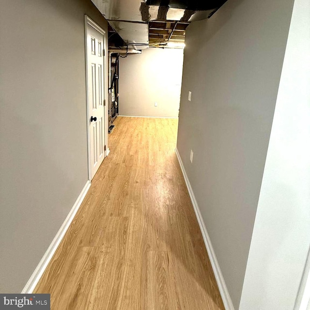 hallway featuring light hardwood / wood-style flooring