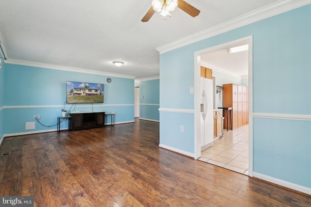 unfurnished living room featuring ceiling fan, ornamental molding, and light hardwood / wood-style flooring