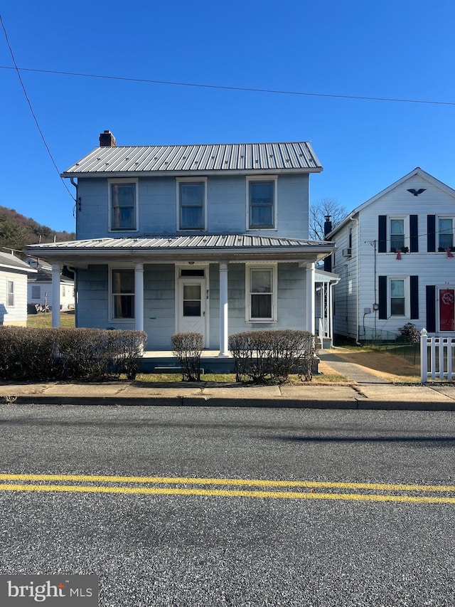 front facade featuring covered porch