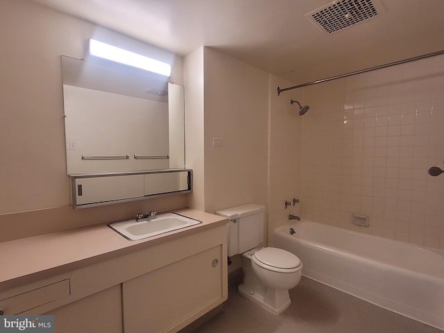 full bathroom featuring vanity, toilet, and tiled shower / bath