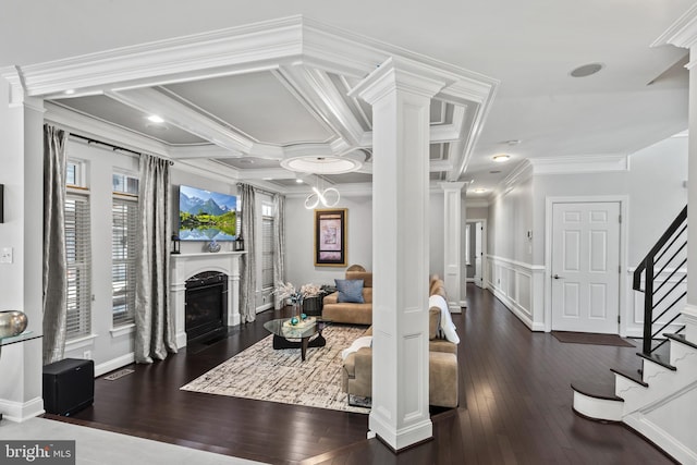 living room with beam ceiling, dark hardwood / wood-style flooring, coffered ceiling, and crown molding