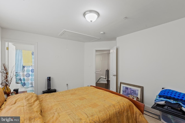 bedroom with a baseboard heating unit