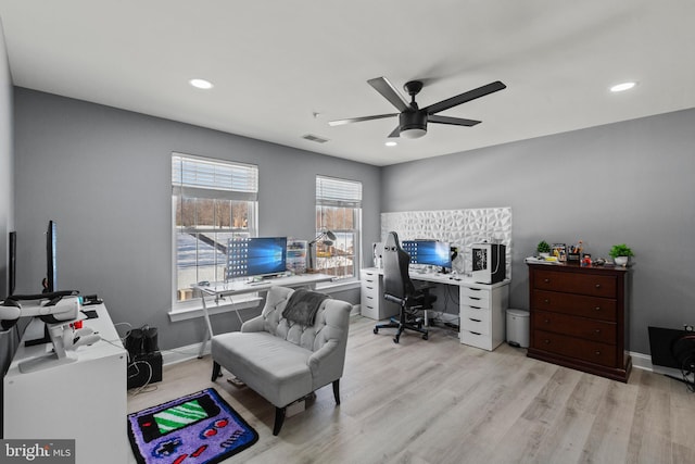 office featuring ceiling fan and light hardwood / wood-style floors