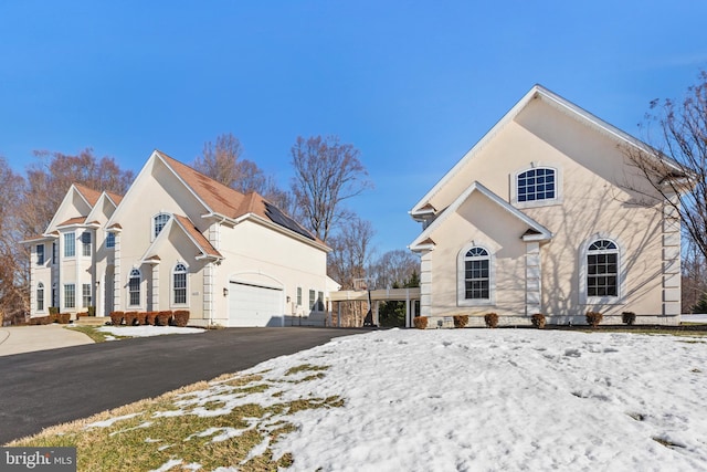 view of snow covered property