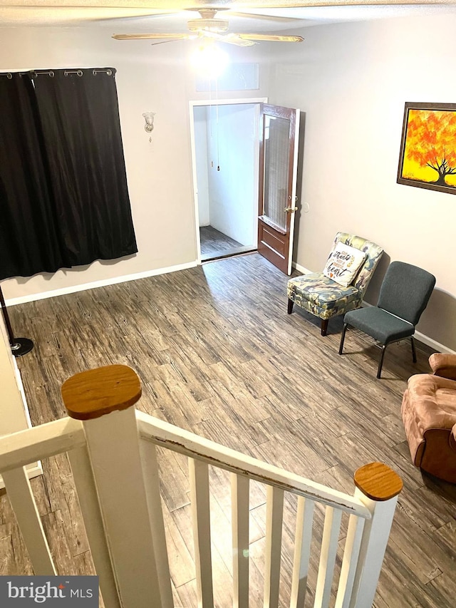 sitting room featuring hardwood / wood-style flooring