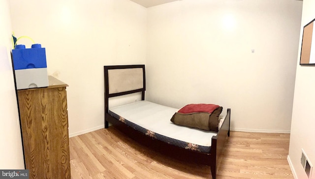 bedroom featuring light hardwood / wood-style flooring