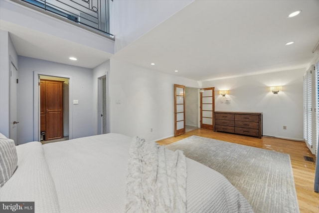 bedroom featuring light hardwood / wood-style flooring