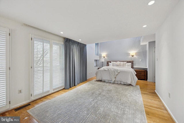 bedroom featuring light hardwood / wood-style floors